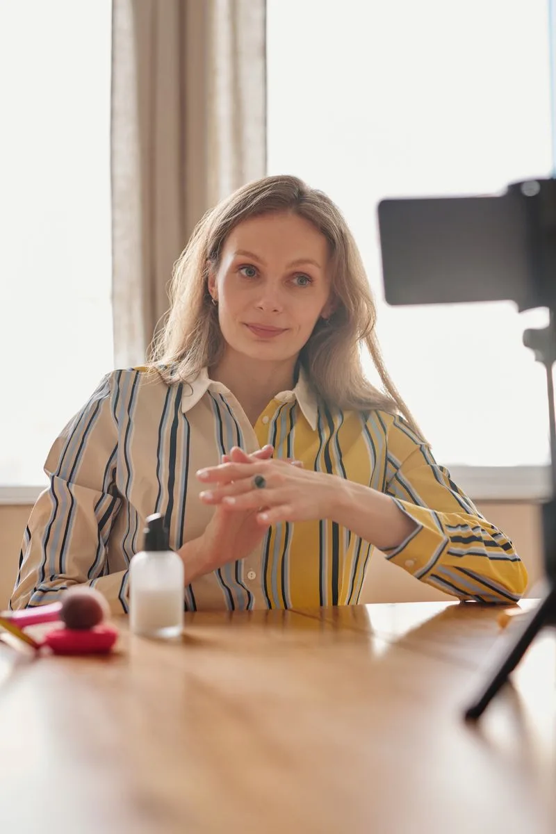 Content creator filming with a smartphone